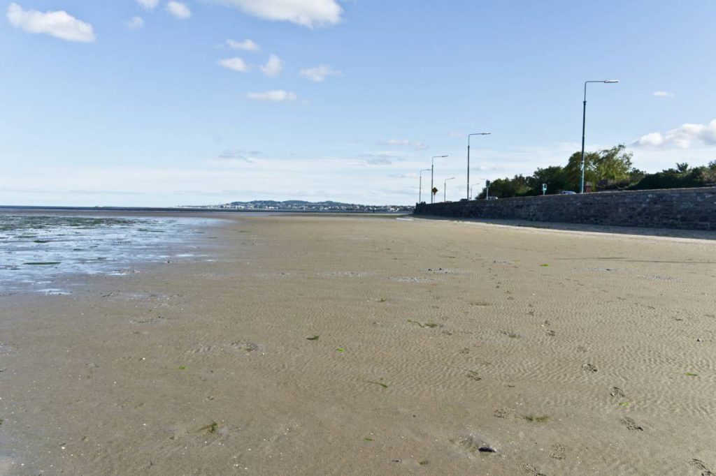 Sandymount Strand with the tide out. I've heard some people have ended up with wet shoes because they walked all the way out only to have the tide start coming back in faster than they could retreat. So, if you decide to make the trek out at low tide, be sure you know when the tide is going to start coming back in! Photo by William Murphy.