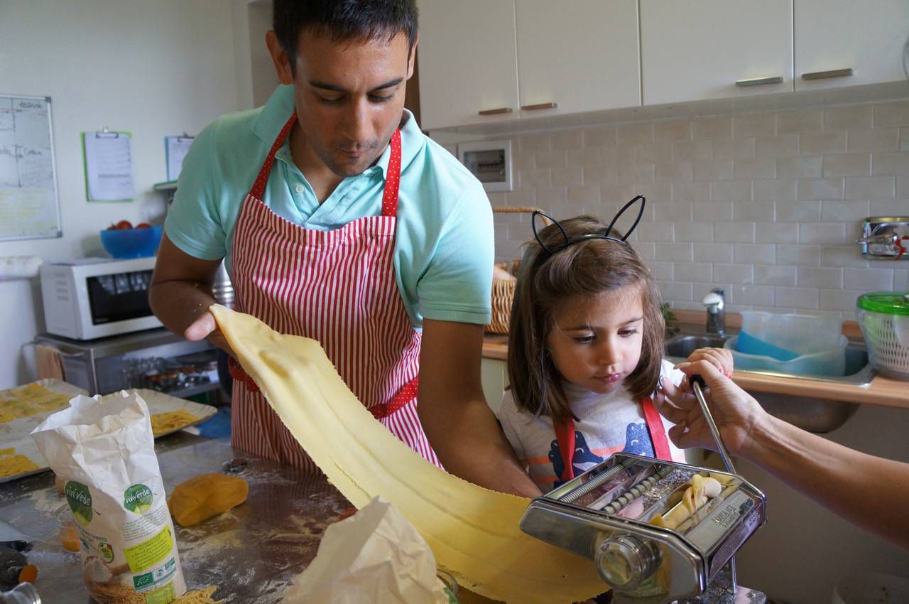 The kids learn to make pasta