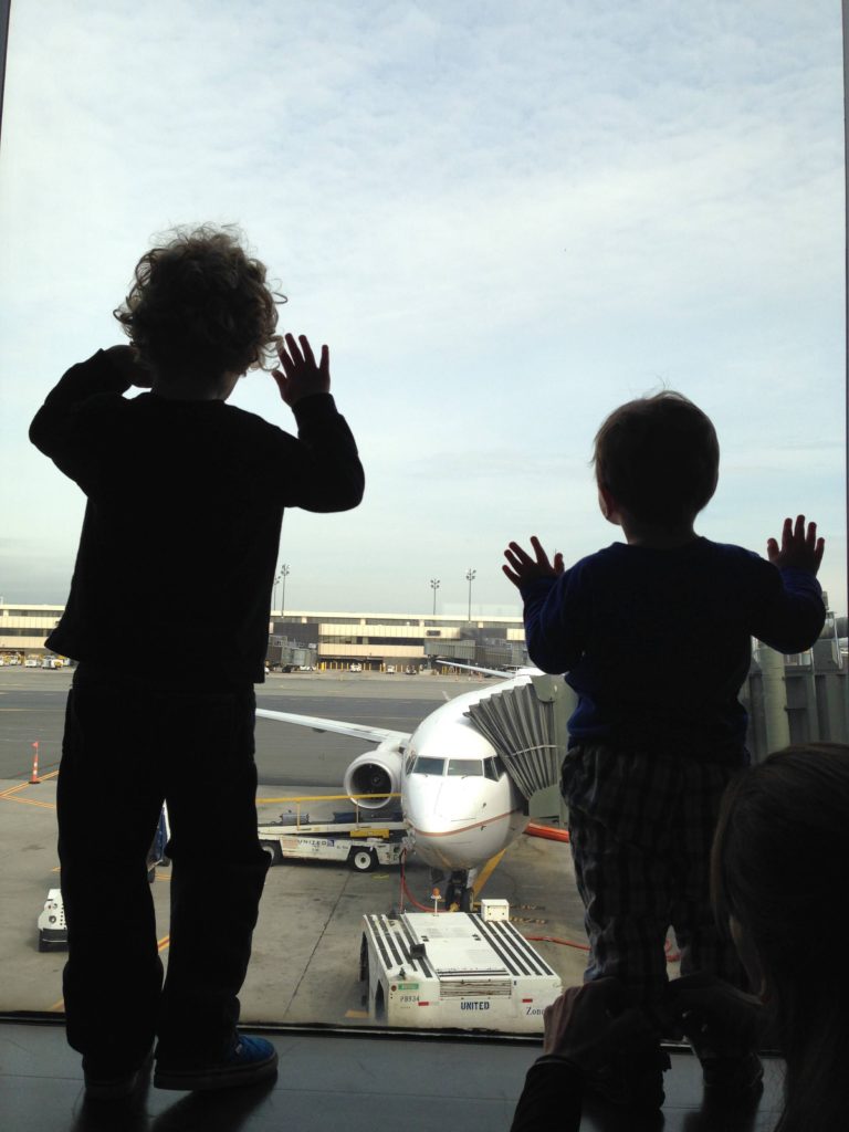 The calm before the storm. The boys loved watching planes take off and land. They weren’t as thrilled about their own 7-hour flight once en route…